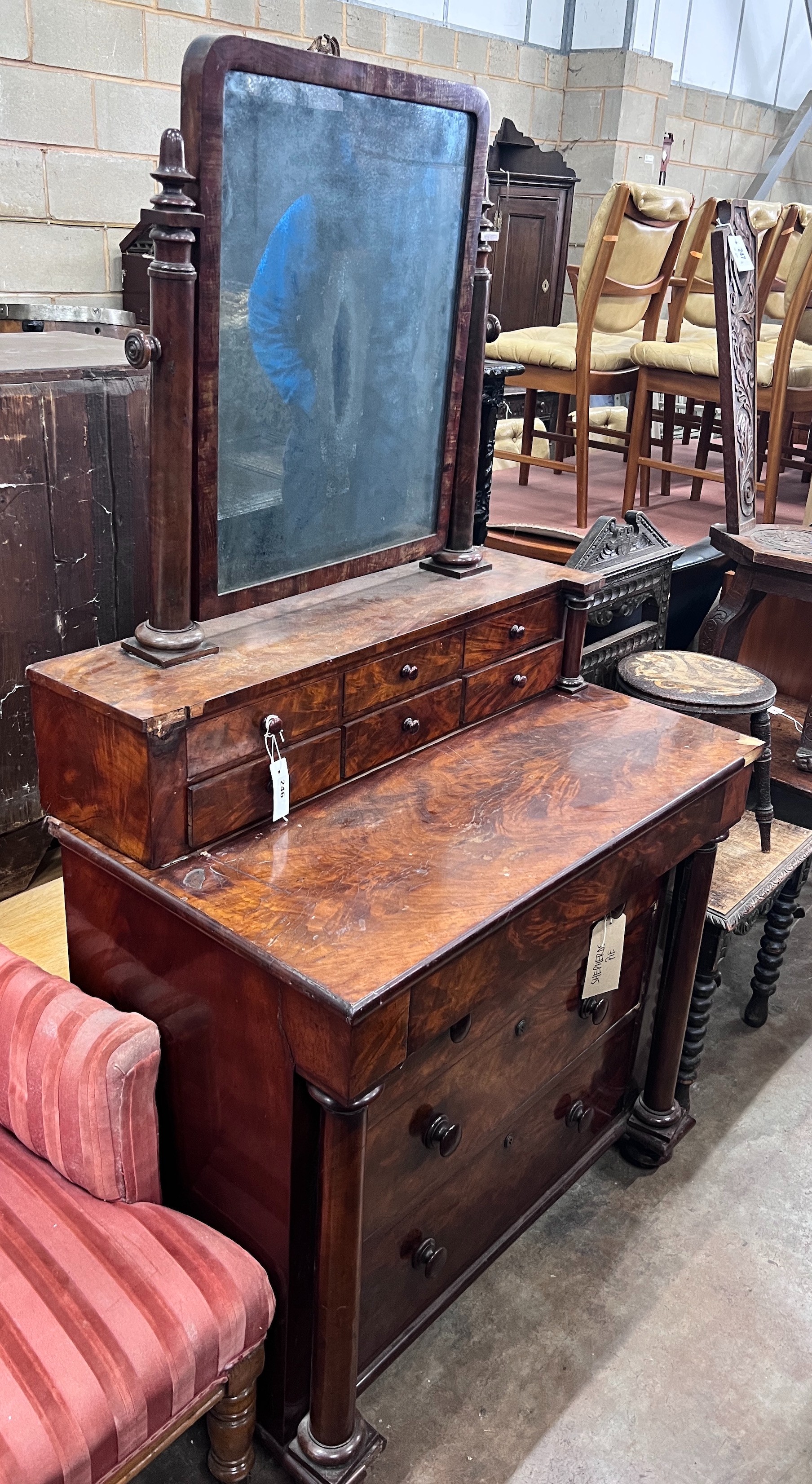 A 19th century French flame mahogany dressing chest, width 90cm *Please note the sale commences at 9am.